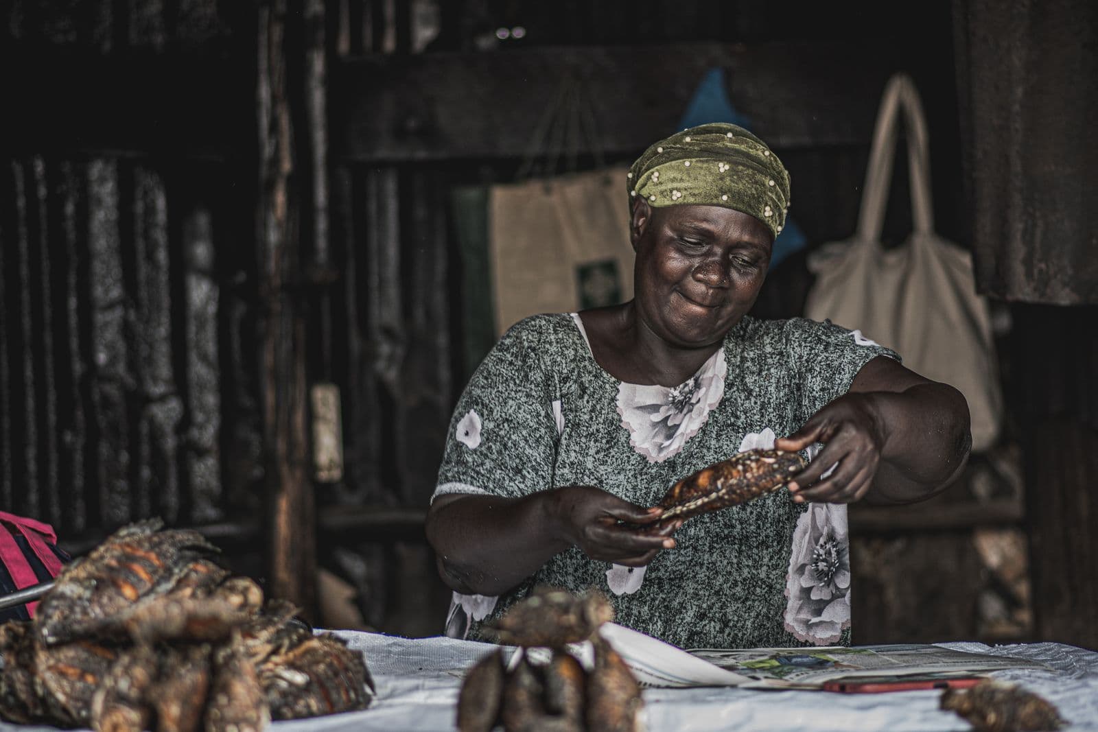 A small business owner at a market stall in Nairobi, the kind of trader who now has to issue eTIMS invoices for every sale